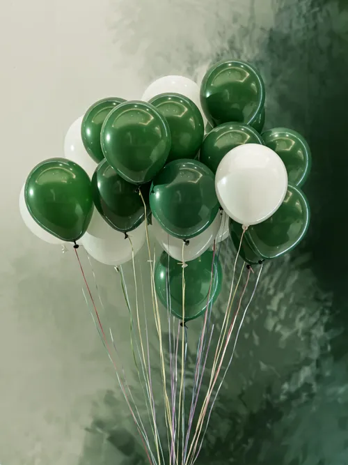 Green and white balloons