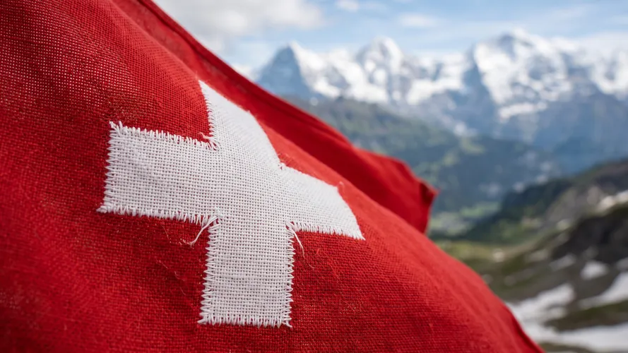 Swiss Flag with Mountain Landscape